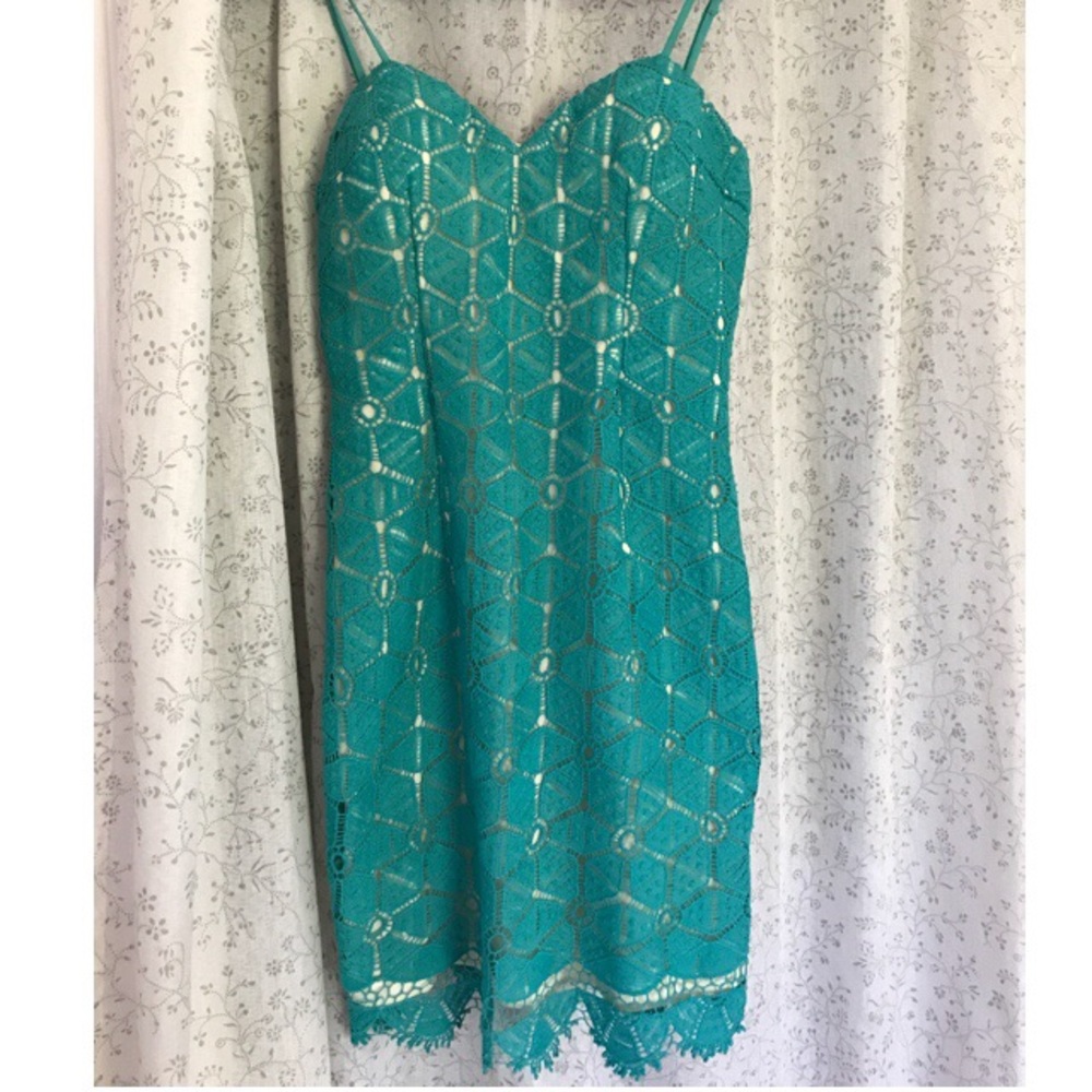 Detailed turquoise dress